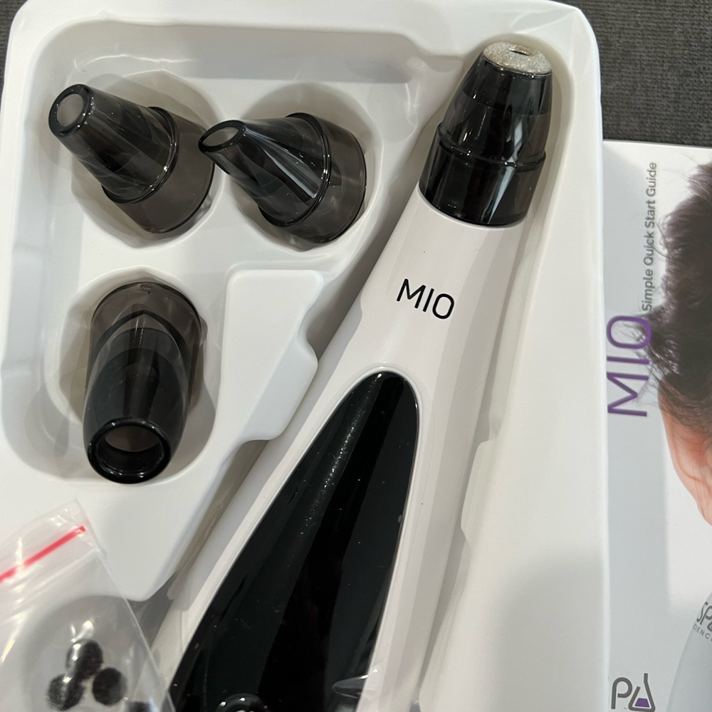 Mio diamond microdermabrasion and pore extraction skin resurfacing system